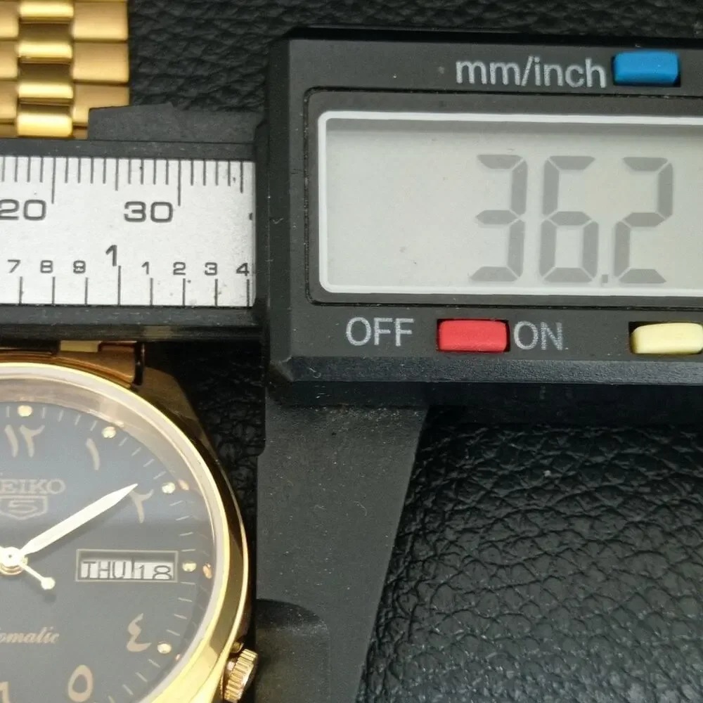 Vintage 1972 Seiko Automatic Mens Gold Watch W/daydate & Black accents